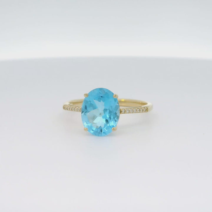 Blue Topaz and Diamond Ring